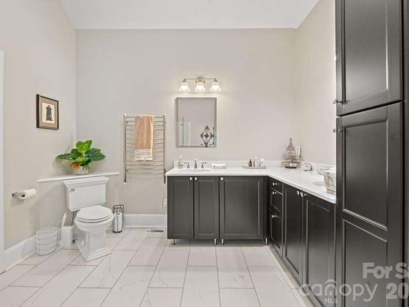 17426 Springwinds Drive, Cornelius, NC 28031.  MLS# CAR4333275, YatesRealty ID 16307. Primary bath dual sinks