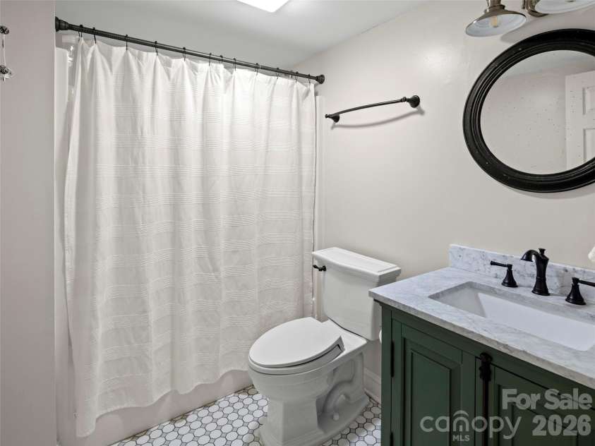 109 Galloway Drive, Asheville, NC 28803.  MLS# CAR4343721, YatesRealty ID 16308. Lower level full bath