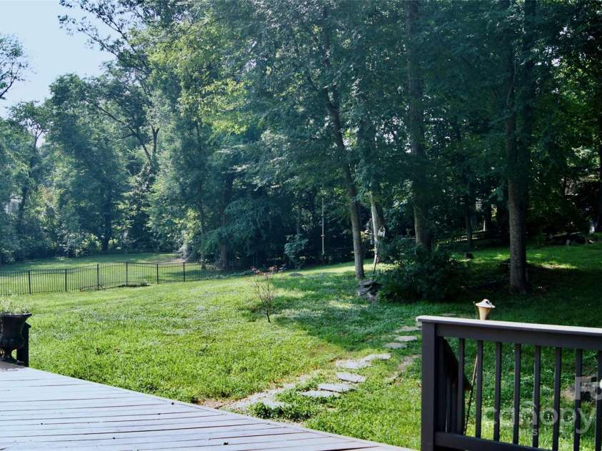 4905 Montibello Drive, Charlotte, NC 28226.  MLS# CAR4252898, YatesRealty ID 16311. BACKYARD DECK VIEW