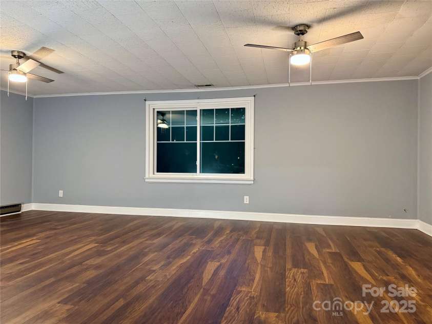 4905 Montibello Drive, Charlotte, NC 28226.  MLS# CAR4302789, YatesRealty ID 16311. Entertainment Room over Garage 