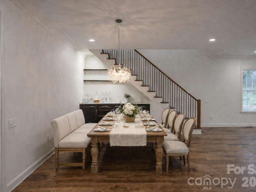 7217 Tesh Road, Monroe, NC 28110.  MLS# CAR4263981, YatesRealty ID 16313. Dining- AI Generated staging