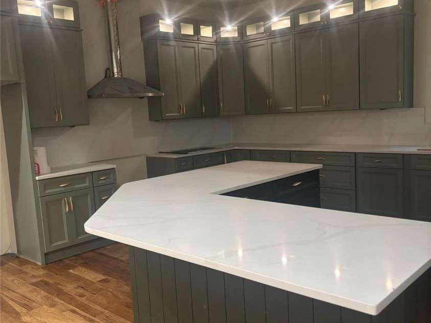 7217 Tesh Road, Monroe, NC 28110.  MLS# CAR4263981, YatesRealty ID 16313. Kitchen with uppers lighted 