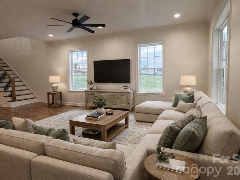7217 Tesh Road, Monroe, NC 28110.  MLS# CAR4263981, YatesRealty ID 16313. Living room- AI Generated staging