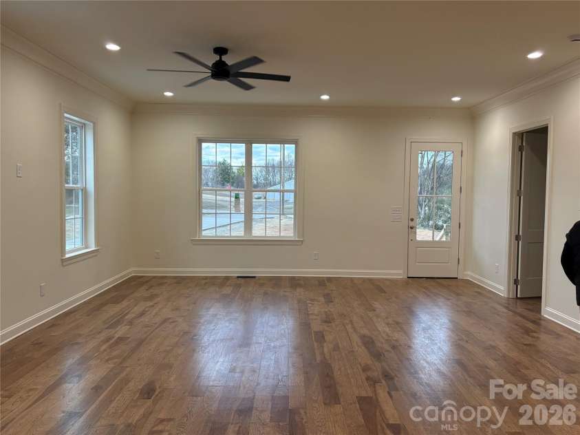 7217 Tesh Road, Monroe, NC 28110.  MLS# CAR4263981, YatesRealty ID 16313. Living room view from dining