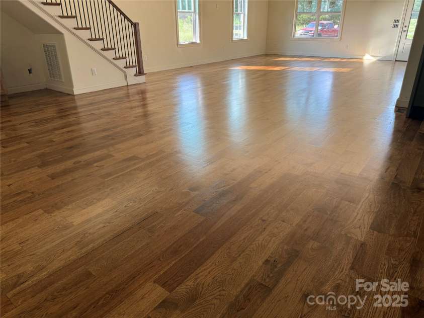 7217 Tesh Road, Monroe, NC 28110.  MLS# CAR4263981, YatesRealty ID 16313. Lower level Hickory hardwoods.