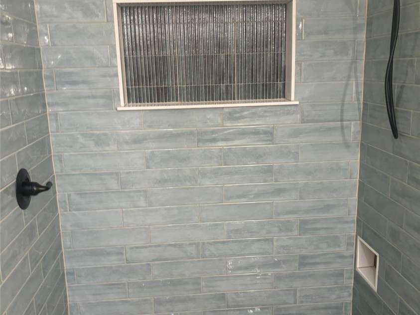 7217 Tesh Road, Monroe, NC 28110.  MLS# CAR4263981, YatesRealty ID 16313. Lower level shower