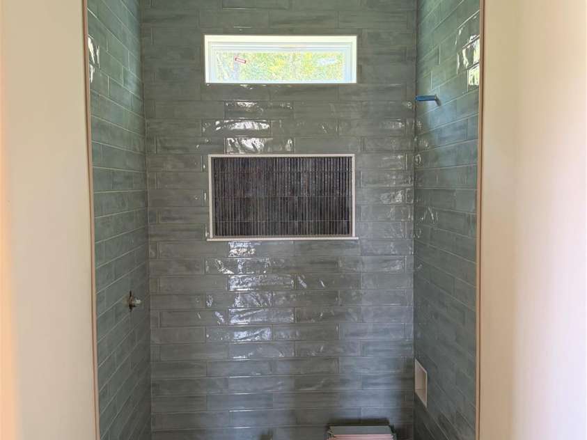 7217 Tesh Road, Monroe, NC 28110.  MLS# CAR4263981, YatesRealty ID 16313. Tile work first floor bath