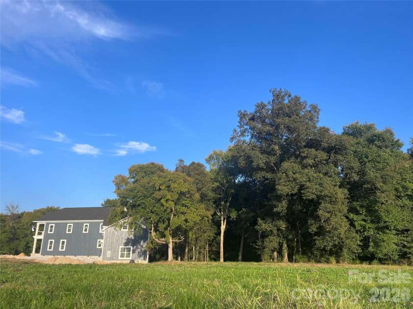 7217 Tesh Road, Monroe, NC 28110.  MLS# CAR4263981, YatesRealty ID 16313. View from property line to home