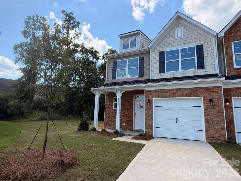 4365 Black Court, Harrisburg, NC 28075.  MLS# CAR4362516, YatesRealty ID 16315. Homesite 214 features an end-unit Cary plan