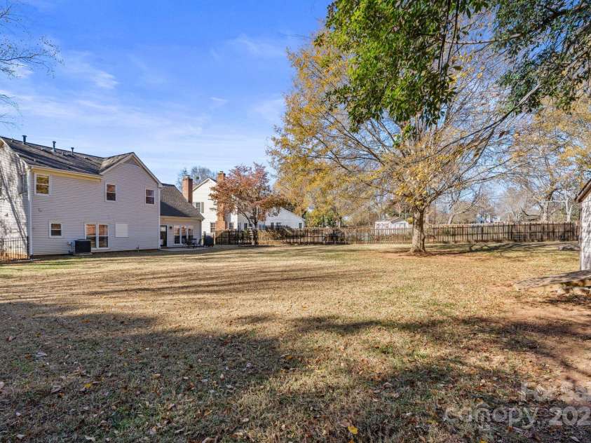123 Southhaven Drive, Mooresville, NC 28117.  MLS# CAR4322533, YatesRealty ID 16318. Fully fenced backyard with mature landscaping 