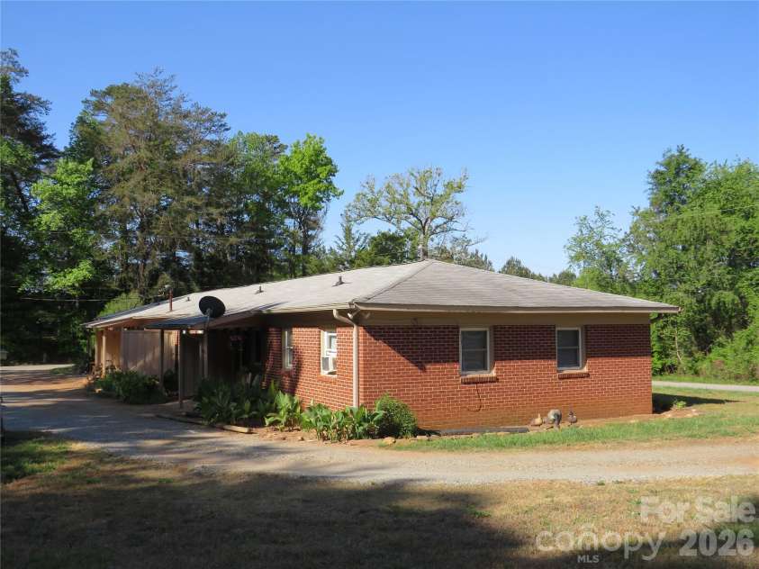 144 Nottingham Drive, Forest City, NC 28043.  MLS# CAR4374138, YatesRealty ID 16318. 110 Evergreen back and side view