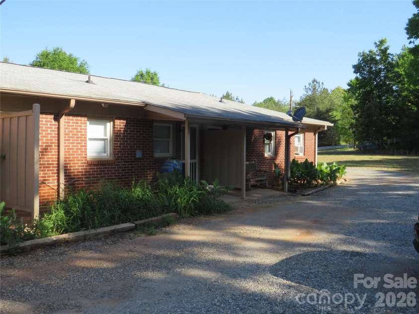 144 Nottingham Drive, Forest City, NC 28043.  MLS# CAR4374138, YatesRealty ID 16318. 110 Evergreen back view