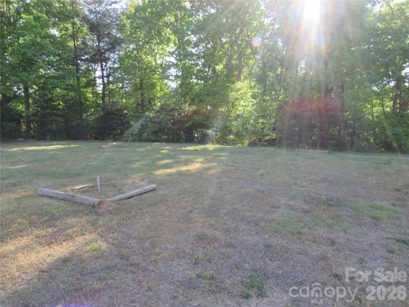 144 Nottingham Drive, Forest City, NC 28043.  MLS# CAR4374138, YatesRealty ID 16318. Evergreen extra lot