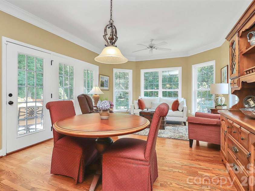 13824 Glen Abbey Drive, Charlotte, NC 28278.  MLS# CAR4350005, YatesRealty ID 16320. Breakfast area  opens to deck and keeping room