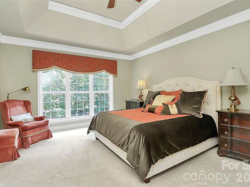13824 Glen Abbey Drive, Charlotte, NC 28278.  MLS# CAR4350005, YatesRealty ID 16320. Primary bedroom w/backyard view