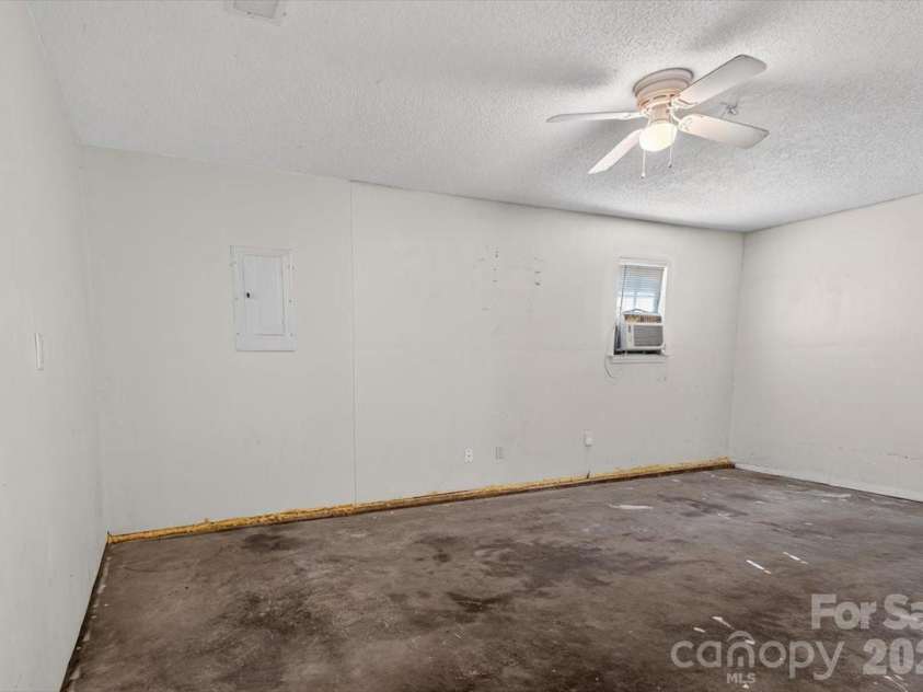 7124 Rumple Road, Charlotte, NC 28262.  MLS# CAR4337483, YatesRealty ID 16326. Converted Garage/Flex Space