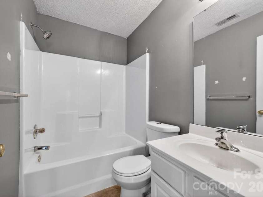 7124 Rumple Road, Charlotte, NC 28262.  MLS# CAR4337483, YatesRealty ID 16326. Hallway Bathroom