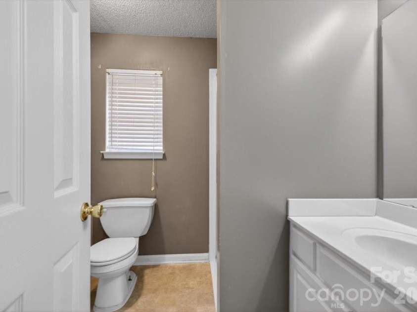 7124 Rumple Road, Charlotte, NC 28262.  MLS# CAR4337483, YatesRealty ID 16326. Primary Bathroom