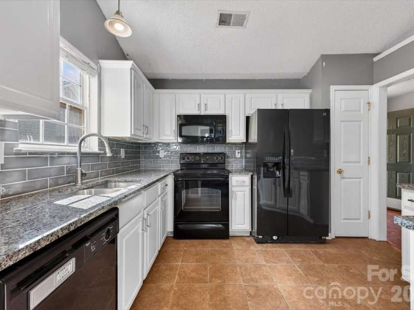 7124 Rumple Road, Charlotte, NC 28262.  MLS# CAR4337483, YatesRealty ID 16326. Updated Kitchen