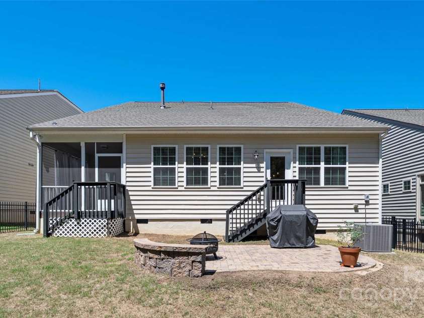 2333 Talon Point Circle, Fort Mill, SC 29715.  MLS# CAR4248868, YatesRealty ID 16327. Paver patio with fire pit and bench