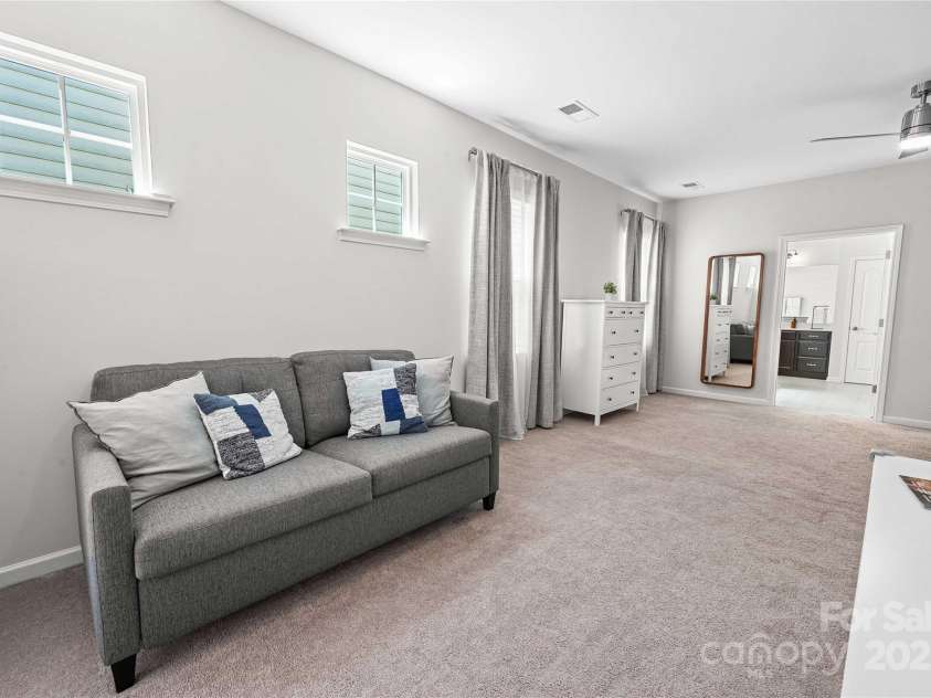 2333 Talon Point Circle, Fort Mill, SC 29715.  MLS# CAR4248868, YatesRealty ID 16327. Sitting Area in the bedroom suite