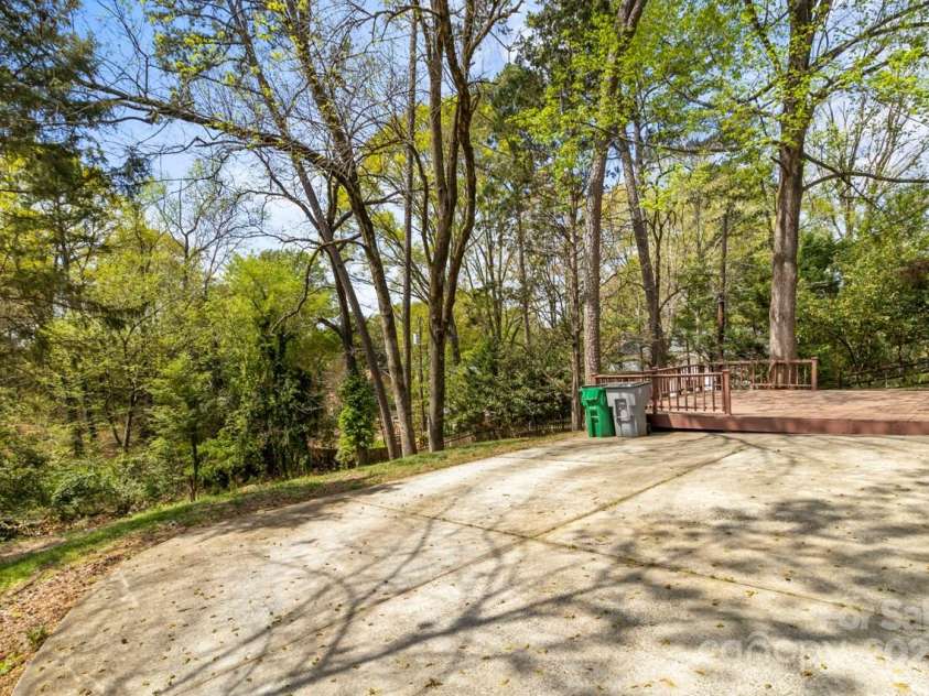 6614 Old Providence Road, Charlotte, NC 28226.  MLS# CAR4241180, YatesRealty ID 16328. Backyard from left side