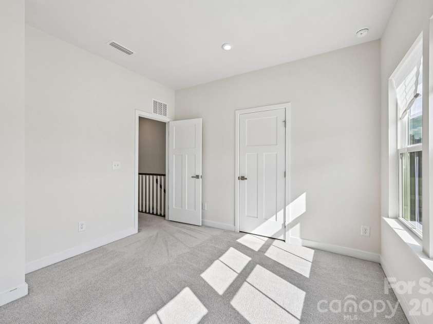 957 Portrush Lane, Tega Cay, SC 29708.  MLS# CAR4405382, YatesRealty ID 16329. Additional windows only for end units