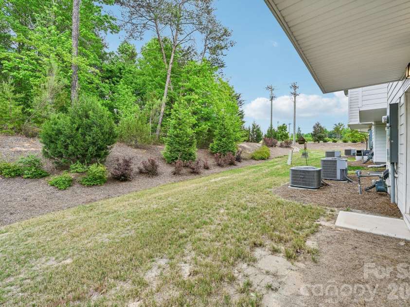 957 Portrush Lane, Tega Cay, SC 29708.  MLS# CAR4405382, YatesRealty ID 16329. Back entrance