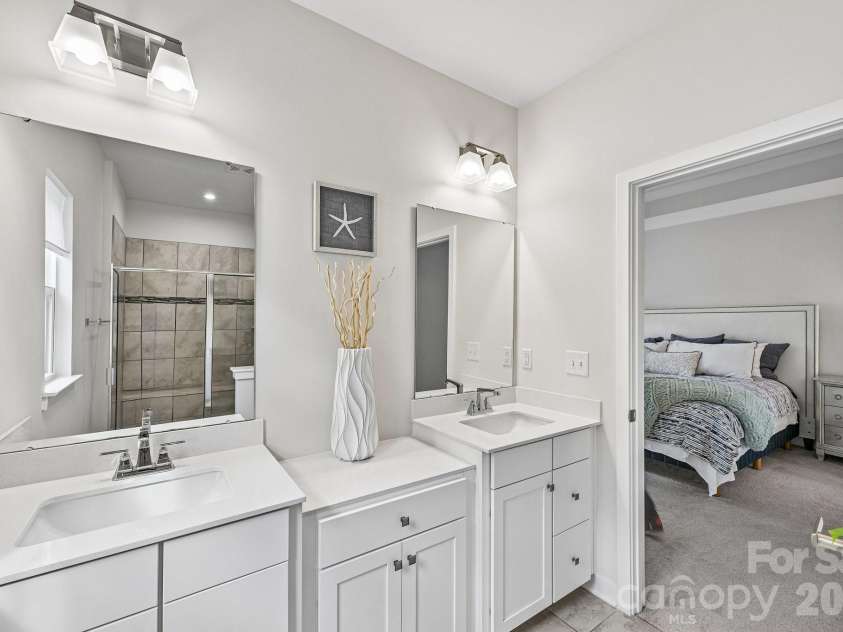 957 Portrush Lane, Tega Cay, SC 29708.  MLS# CAR4405382, YatesRealty ID 16329. Double vanity sinks