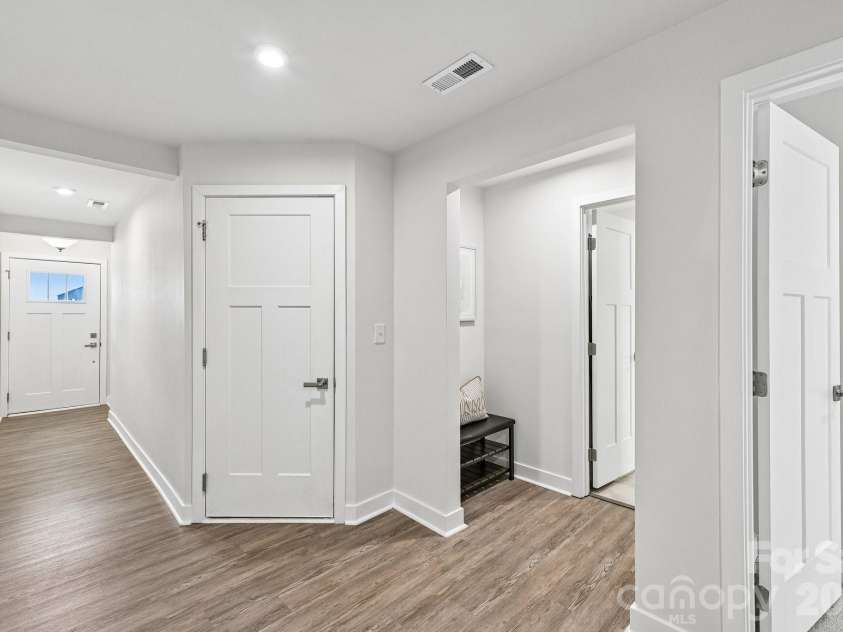 957 Portrush Lane, Tega Cay, SC 29708.  MLS# CAR4405382, YatesRealty ID 16329. First floor entrances, including 2- car garage