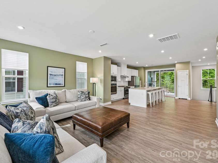 957 Portrush Lane, Tega Cay, SC 29708.  MLS# CAR4405382, YatesRealty ID 16329. Kitchen pantry and half bathroom on this floor
