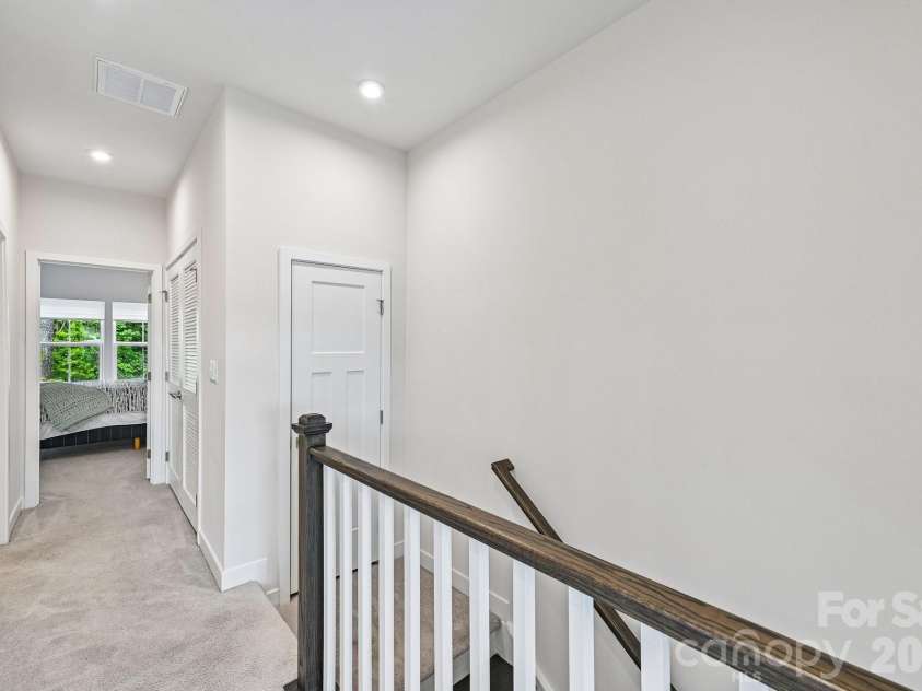 957 Portrush Lane, Tega Cay, SC 29708.  MLS# CAR4405382, YatesRealty ID 16329. Third floor hallway and additional storage