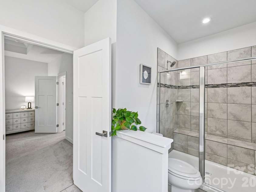 957 Portrush Lane, Tega Cay, SC 29708.  MLS# CAR4405382, YatesRealty ID 16329. Walk in tile shower