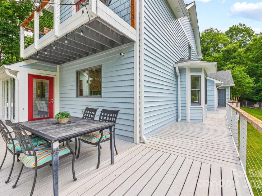 18028 Broken Woods Road, Charlotte, NC 28278.  MLS# CAR4255831, YatesRealty ID 16331. Wrap around deck with views of the lake