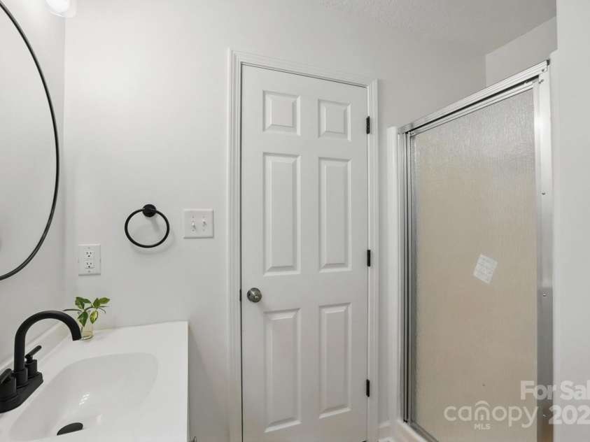 2530 Cochrane Drive, Charlotte, NC 28269.  MLS# CAR4250404, YatesRealty ID 16332. Master shower