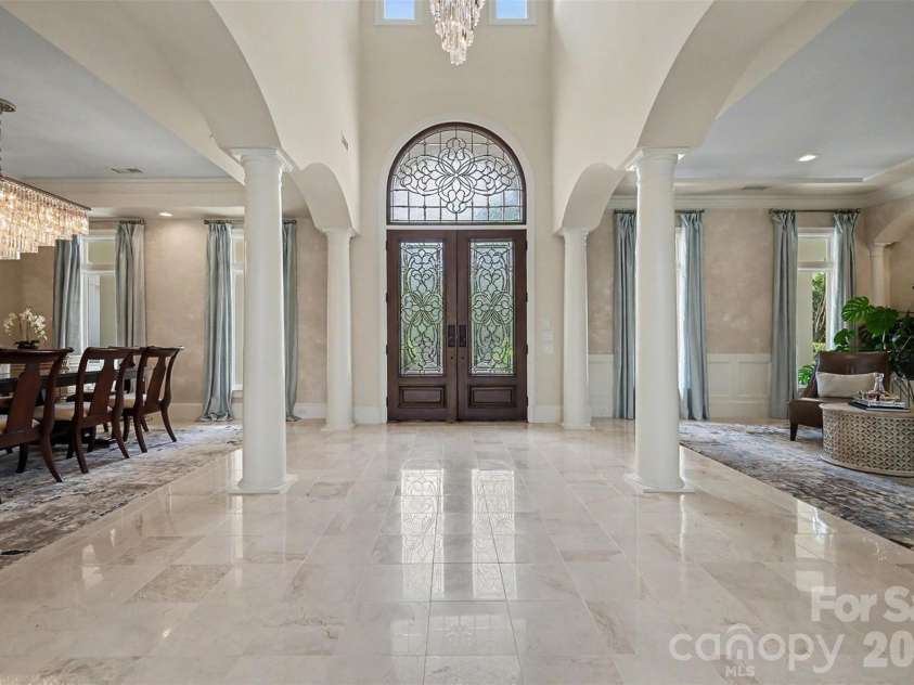 7225 Governors Row, Charlotte, NC 28277.  MLS# CAR4364336, YatesRealty ID 16333. Elegant Foyer with RH Grand RH Chandelier