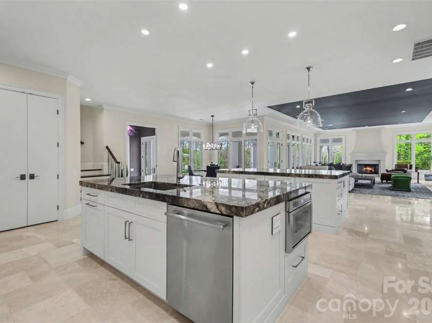7225 Governors Row, Charlotte, NC 28277.  MLS# CAR4364336, YatesRealty ID 16333. Kitchen with double islands and state of the art appliances