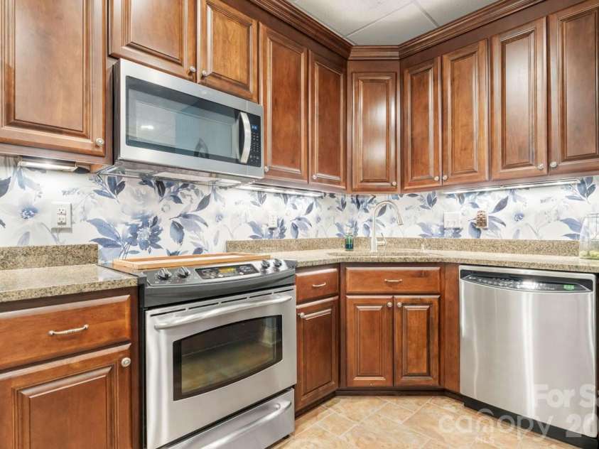 402 Golfview Court, Lenoir, NC 28645.  MLS# CAR4332999, YatesRealty ID 16337. Basement Kitchen