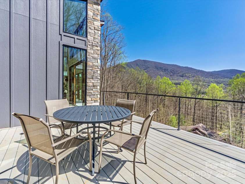 75 Ladyslipper Lane, Waynesville, NC 28786.  MLS# CAR4241976, YatesRealty ID 16337. Ample entertaining spaces