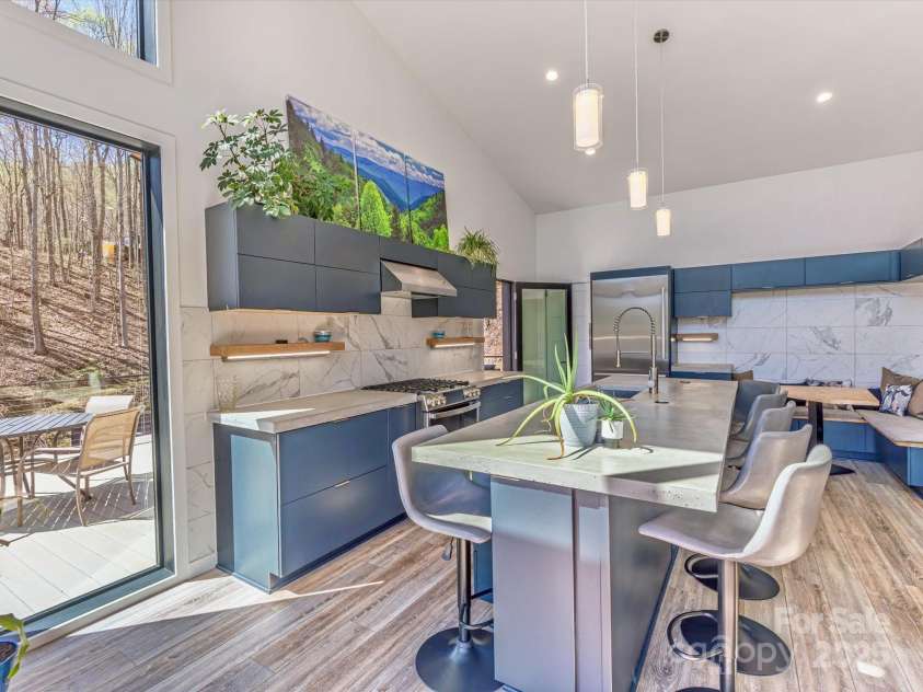 75 Ladyslipper Lane, Waynesville, NC 28786.  MLS# CAR4241976, YatesRealty ID 16337. Custom cabinetry and concrete countertops