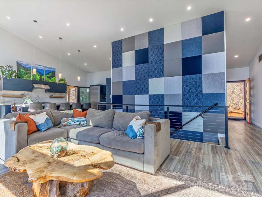 75 Ladyslipper Lane, Waynesville, NC 28786.  MLS# CAR4241976, YatesRealty ID 16337. Custom fabric wall - an artistic interpretation of the Great Smokies!