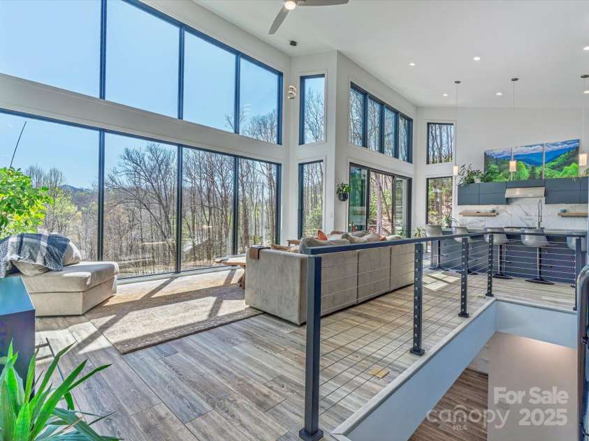 75 Ladyslipper Lane, Waynesville, NC 28786.  MLS# CAR4241976, YatesRealty ID 16337. Enter into the natural light lovers dream!