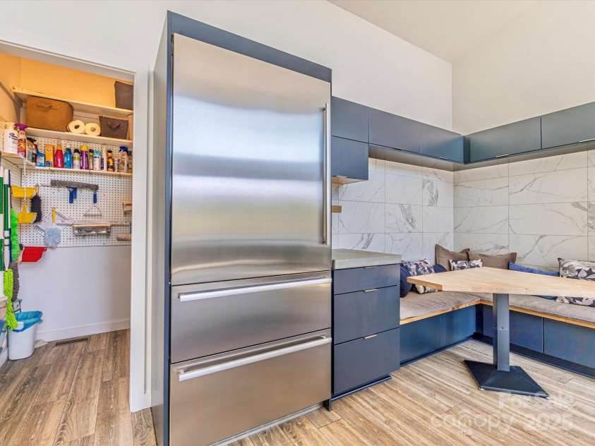 75 Ladyslipper Lane, Waynesville, NC 28786.  MLS# CAR4241976, YatesRealty ID 16337. Liebherr brand fridge and custom bench seating drawer storage