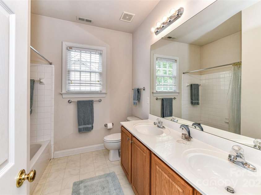 306 Ashby Drive, Davidson, NC 28036.  MLS# CAR4234348, YatesRealty ID 16338. Full bathroom on the second floor with double sinks