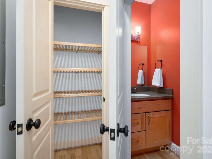 20 Grandview Drive, Asheville, NC 28806.  MLS# CAR4254983, YatesRealty ID 16343. Ample pantry and centrally located 1/2  bath on main level