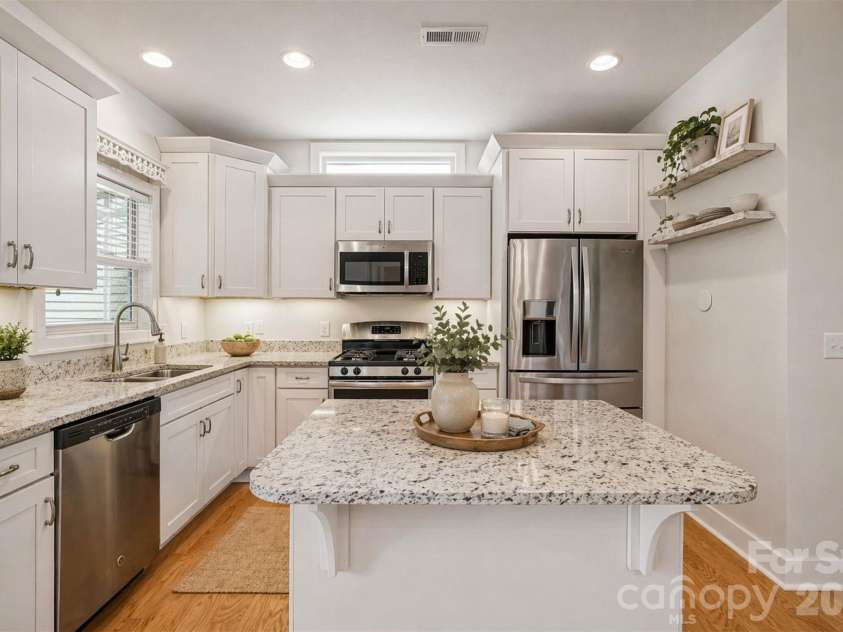 163 Windstone Drive, Fletcher, NC 28732.  MLS# CAR4372370, YatesRealty ID 16344. Beautiful kitchen with ample cabinetry, generous counter space, and functional layout for everyday use.