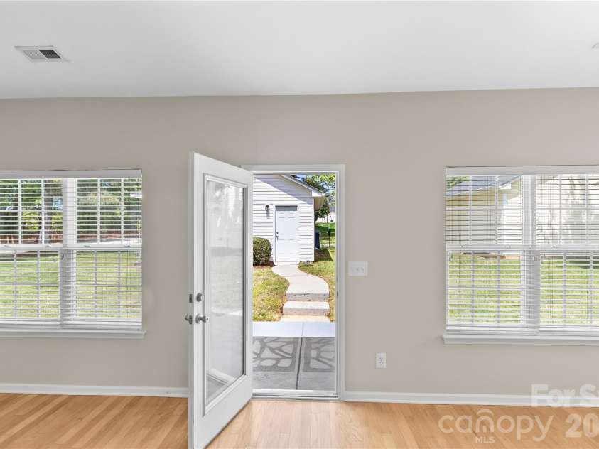 8711 Westwind Point Drive, Cornelius, NC 28031.  MLS# CAR4367141, YatesRealty ID 16348. View into the backyard