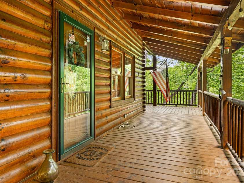 108 Cougar Alley, Lake Lure, NC 28746.  MLS# CAR4256706, YatesRealty ID 16349. Covered front porch