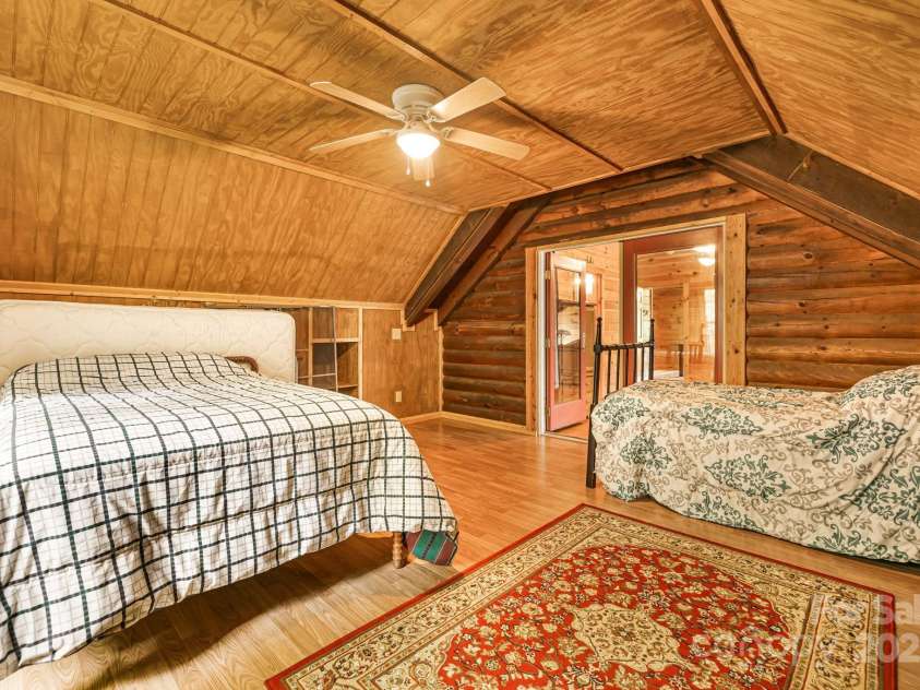 108 Cougar Alley, Lake Lure, NC 28746.  MLS# CAR4256706, YatesRealty ID 16349. Extra room over carport