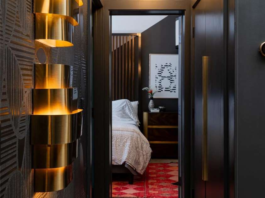 46 Dortch Avenue, Asheville, NC 28801.  MLS# CAR4146963, YatesRealty ID 16353. Inside leads with a moody Mid-century aesthetic.  With chic color and texture play, modern finishes and conveniences, this 3 sleeping room home passes the vibe check.